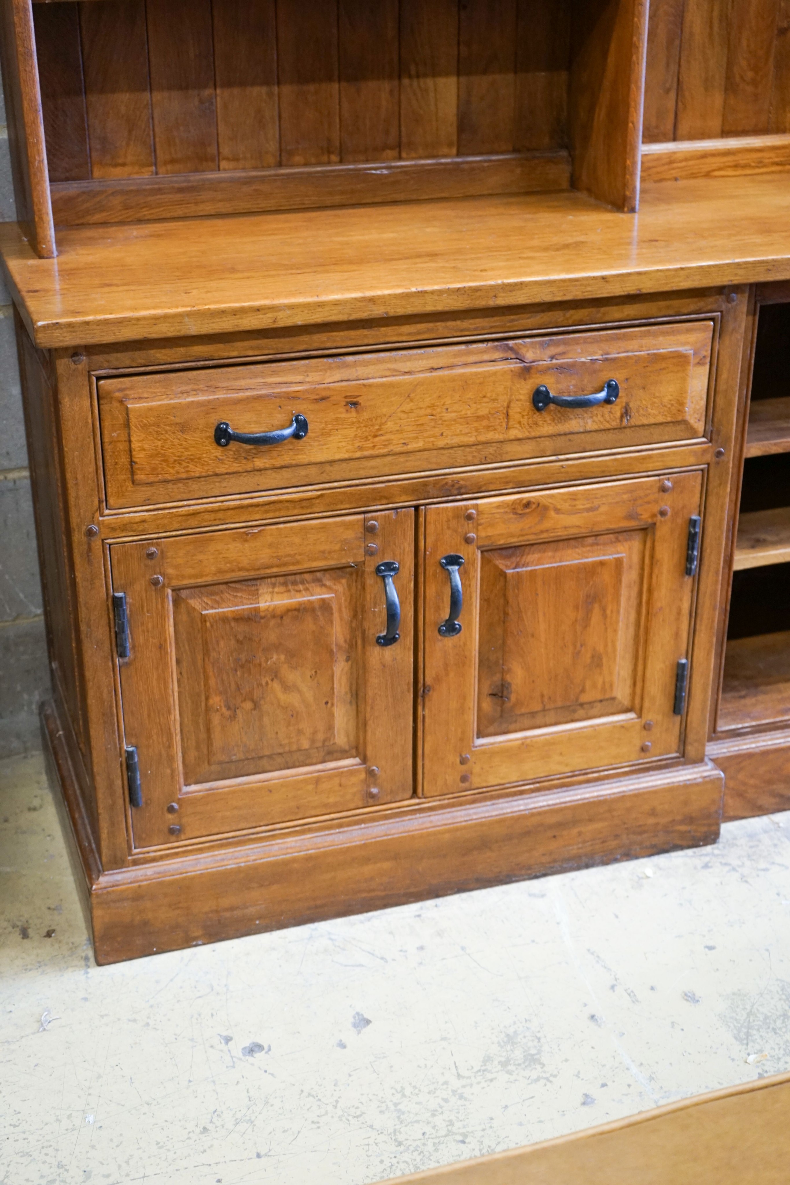 A large reproduction oak dresser, length 210cm, depth 48cm, height 225cm